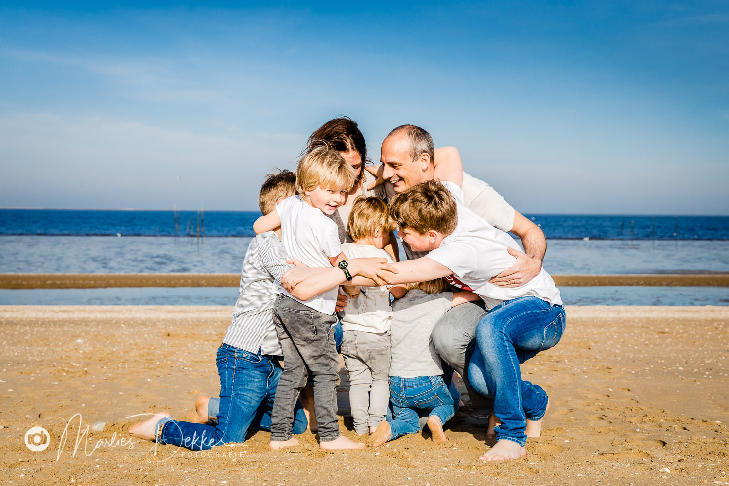 Familie fotoshoot op het strand