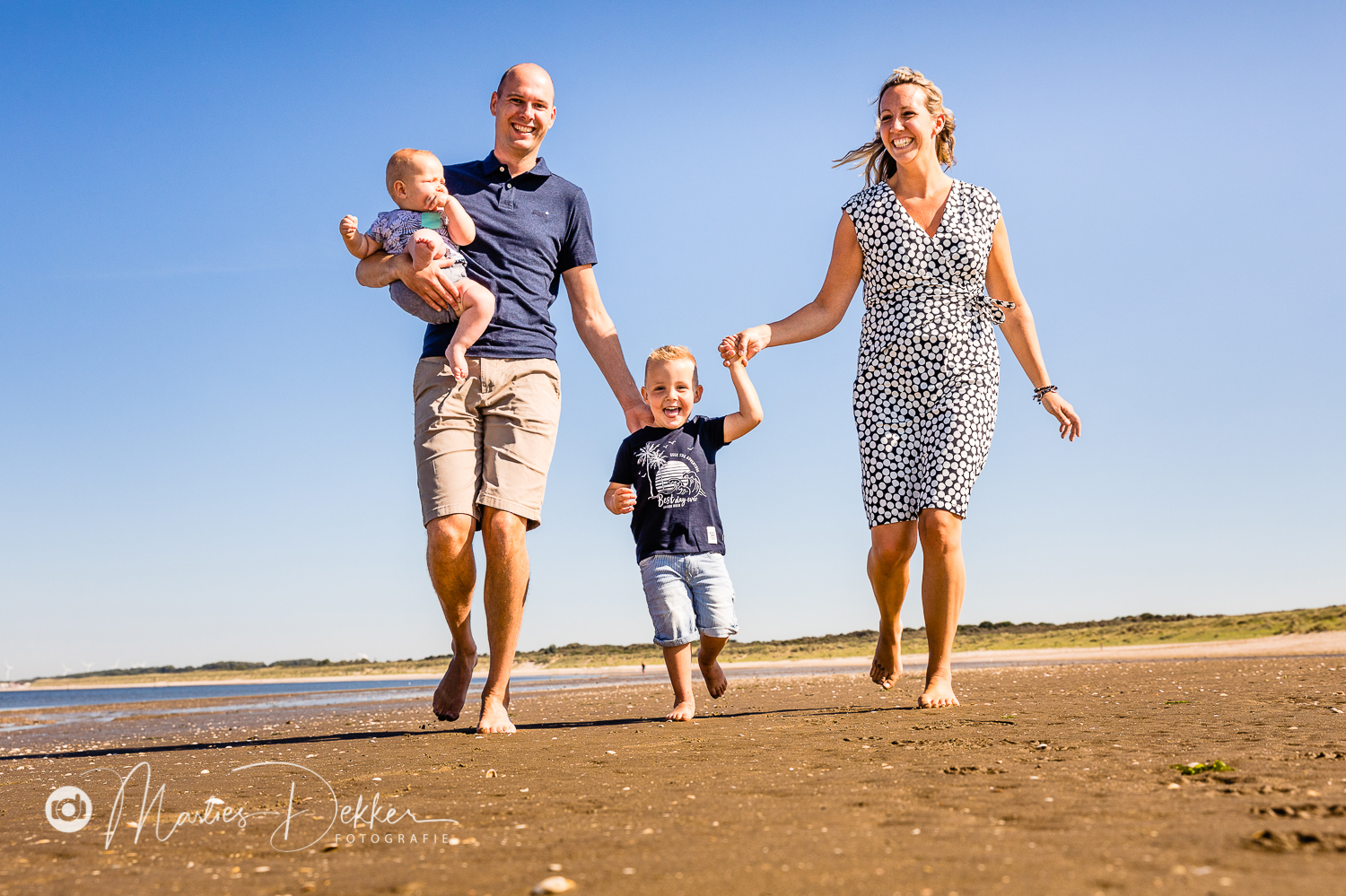 familiefotoshoot op het strand
